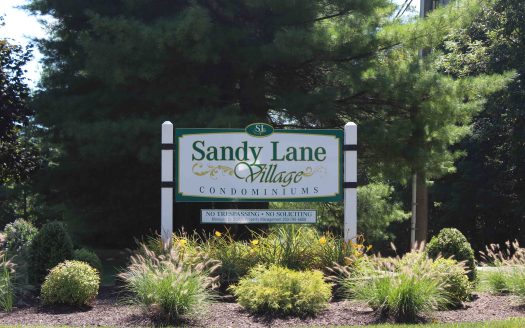 Front entrance sign of Sandy Lane Village in Brookfield Connecticut